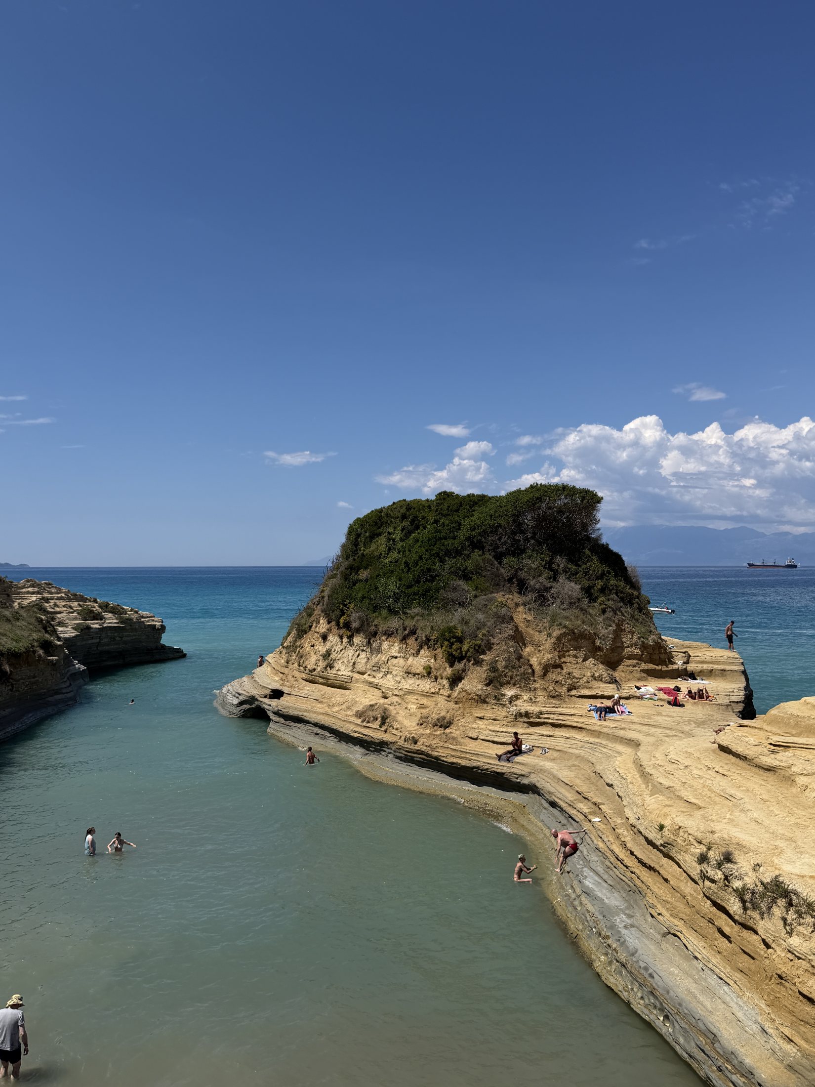 A rocky Greek cove and clear blue water